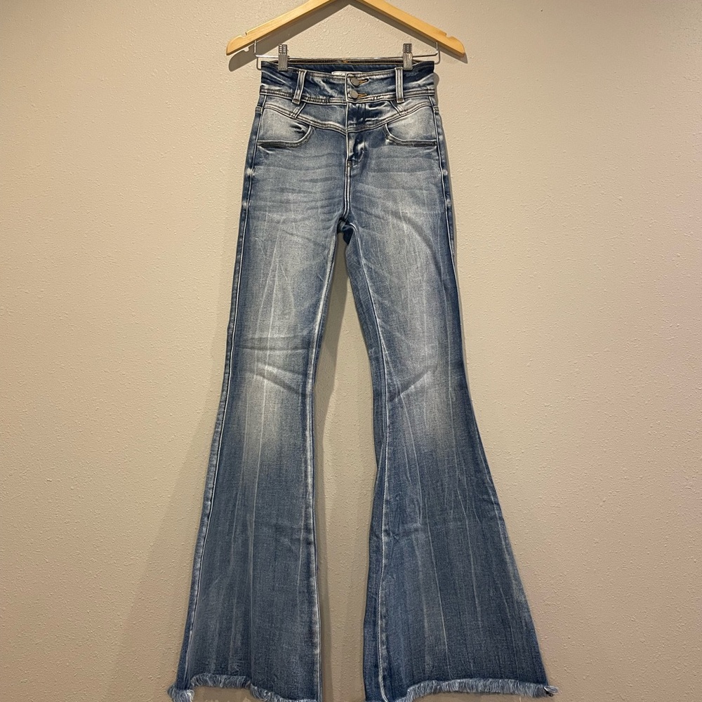 KanCan button fly washed out distressed hem flare jeans